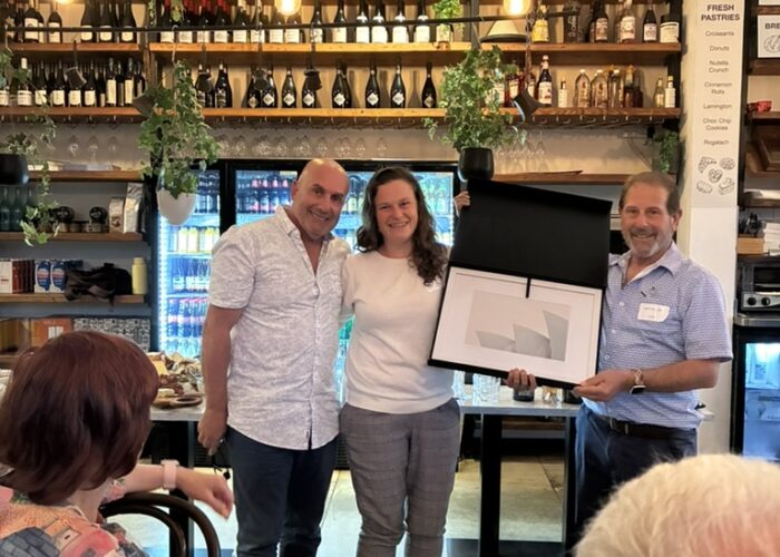 Hadar Lev-Tzori receiving her gift from Danny Hochberg and Larry Lockshin